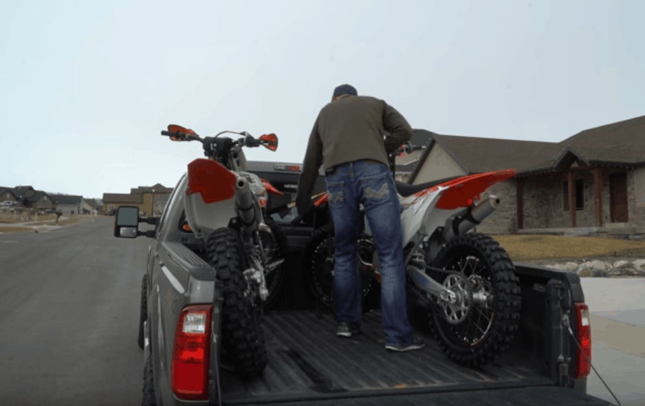 Loading dirt bikes on to a truck tray solo